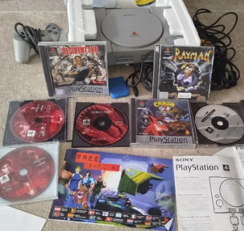 PS1 Completa con caja corchos y manuales - Buen Estado